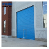 Porte de garage sectionnelle industrielle commerciale automatique atelier intérieur extérieur sécurité