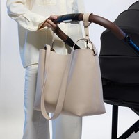 Sac à langer de voyage en cuir vegan imperméable DUOLE personnalisé avec 2 sangles pour poussette pour les parents, maman, luxe