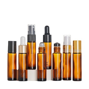 Botella de Vidrio Marrón con Roll-On de 10 ml, Envase Cosmético a Prueba de Luz, Dispensador de Aceite Esencial en Forma de Cilindro con Tapa - Product Image 1