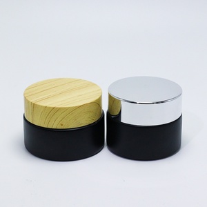 In Stock Wholesale 5/10/15/20/30/50G Matte Black Face Cream <b>Jar</b> Containers 1 2 4 Oz Glass <b>Jars</b> <b>With</b> <b>Plastic</b> Wood Grain <b>Lid</b> - Product Image 5