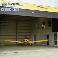 Hangar industriel moderne à grande portée en structure acier pour garage d'avions, entrepôt, atelier, installation rapide