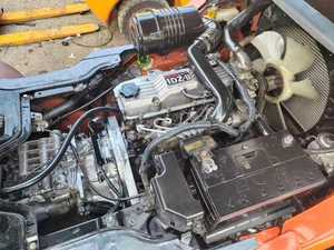 Chariot élévateur à fourche d'occasion à bas prix, 3T, 4 roues motrices, mât à deux étages, pour utilisation agricole, puissance diesel, pompe électrique, origine japonaise, rayon de braquage de 2400 mm - Product Image 6