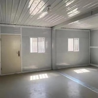 Maison conteneur préfabriquée modulaire en acier de 20 pieds avec mur rideau en verre pour bureau, studio, jardin, extérieur