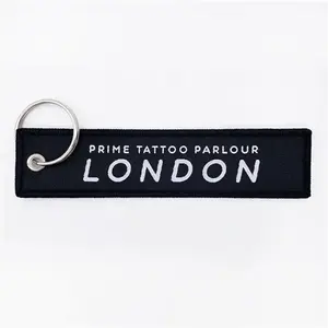 Custom Personalized Fabric Embroidery Key chain Jet Tags Custom Logo Flying Tags Woven Patch Key chains