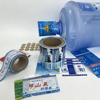 Étiquette thermorétractable en PVC personnalisée, haute transparence, durable, scellage sécurisé, impression couleur, forme personnalisée pour bouchon de bouteille d'eau minérale