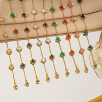 Bracelet de haute qualité, classique, en acier inoxydable plaqué or, double face, à quatre pétales de fleurs, adapté aux hommes et aux femmes