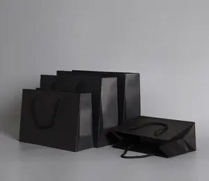 Özel Logo moda yırtılmaz kağıt alışveriş perakende çanta hediyeler için ofset baskı ile tek kullanımlık kaplamalı Kraft