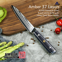 Ensemble de 7 couteaux de cuisine japonais en acier Damas Amber avec manche en résine colorée motif nid d'abeille pour le désossage et les sushis