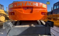 Excavatrice sur pneus Hitachi ZX130W avec peinture d'origine, moteur Isuzu, 13 tonnes, 87,2 kW, haute performance, en stock