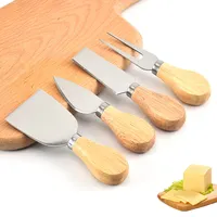 Set di coltelli da formaggio Premium da 4 pezzi con manico in legno di bambù coltello da formaggio in acciaio inossidabile per tagliere