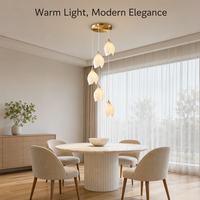 Lustre long de luxe en forme de fleur de magnolia, suspension nordique en porcelaine multi-têtes rotative pour escalier à plafond haut