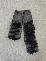 Jean déchiré pour homme 2026, modèle distinctif à jambe longue, avec franges superposées pour un style audacieux – Fabricant de jeans