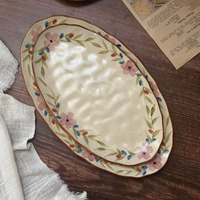Vaisselle en céramique florale peinte à la main de style vintage français, ensemble exquis de tasse à café et soucoupe irrégulière faits à la main pour le thé de l'après-midi