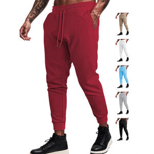 Pantalones deportivos de punto gofrado para hombre, cintura elástica con cordón, transpirables, de color sólido, informales, para el tiempo libre - Product Image 1