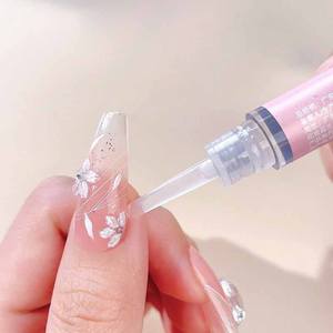 Stylo à huile pour dissolvant d'<span class=keywords><strong>ongles</strong></span> doux et non irritant Enlèvement rapide de la colle solide pour <span class=keywords><strong>ongles</strong></span> portée à la main ne blesse pas les <span class=keywords><strong>ongles</strong></span> - Product Image 3