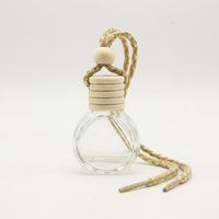 Bouteille vide ronde en verre pour diffuseur d'huiles essentielles à suspendre dans la voiture, avec décoration florale, pendentif désodorisant pour voiture, vente en gros