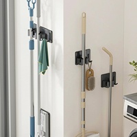 Wandbevestigde mop- en bezemhouder van roestvrij staal, zelfklevende borstelhouder met haak, keukenhulp, mop-hanger