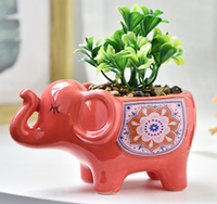 Pot de fleur en céramique émaillée en forme de petit éléphant mignon pour la maison et le jardin en gros
