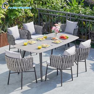 ชุดสวนกลางแจ้งแบบนอร์ดิกที่ทันสมัยเก้าอี้เชือกโลหะทอโต๊ะหินแผ่นพื้นโต๊ะลานระเบียงวิลล่าพักผ่อน4-Seater บังแดด - Product Image 1