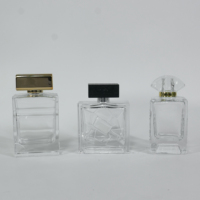 Flacon de parfum en verre transparent personnalisé de 50 ml, flacon de parfum cylindrique à fond épais, flacon de parfum vide en verre avec bouchon