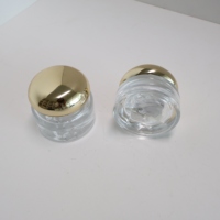 Pot de crème cosmétique en verre écologique de luxe Conception de fond de volcan Nouveau sérum de luxe pour les soins de la peau Crème pour les yeux Caractéristiques Bouteilles en verre