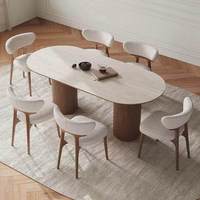 Table à manger moderne en bois de style français, plateau en pierre frittée, petite table ovale en noyer pour appartement, design hôtelier stable, style Wabi-sabi