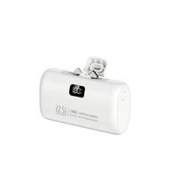 Mini banco de energía 10000mAh con dos enchufes giratorios Pantalla digital PD 20W Cápsula de carga rápida Cargador portátil Salida de