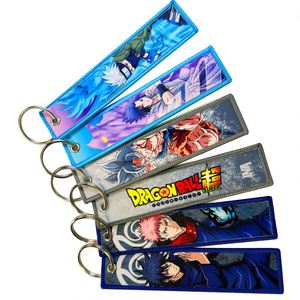Customized Double <b>Anime</b> Floral Animal Logo Printing Fabric Woven <b>Keychains</b> for Souvenirs Sublimation Keychain - Product Image 1