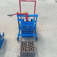 Machine à fabriquer des briques en blocs emboîtables avec moteur, ligne de production de béton manuelle du Shaanxi pour la construction
