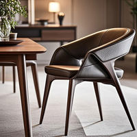Fauteuil en cuir noir luxueux avec pieds en bois massif, adapté au salon, à la salle à manger, au bureau, à l'hôtel, au restaurant et à la villa