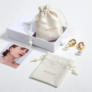 Logo personnalisé imprimé petite pochette de luxe en daim collier cordon bijoux sac d'emballage avec boîte