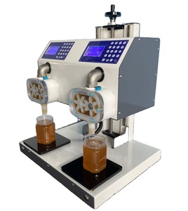 Nouvel équipement apicole 2023 : Machine de remplissage de miel à deux têtes pour bouteilles - Product Image 1