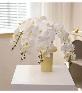 زهور اصطناعية بيضاء من نبات الفالينوبسيس بتصميم يشبه اليد ثلاثي الأبعاد وبها 9 رؤوس وأزهار أوركيد حريرية اصطناعية من نبات الفالينوبسيس