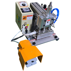 Nouvelle machine à perforer semi-automatique pneumatique à engrenages pour textiles et vêtements, avec emballage en film et en bois, à économie d'énergie - Product Image 1