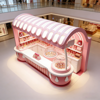 Airy Luxe Bakery & Coffee Market Stall Featuring Glass Display Case, Open Tiered Shelving, and Integrated Warm Lighting