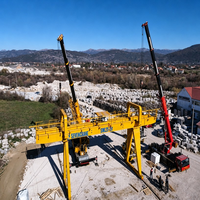Grue portique industrielle sur pneus de 30 tonnes avec moteur et télécommande sans fil haute performance pour la construction de poutres de pont