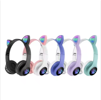 Precio al por mayor, bonitos auriculares inalámbricos con garra de gato, orejas de gato luminosos con auriculares inalámbricos, auriculares estéreo sencillos y bonitos
