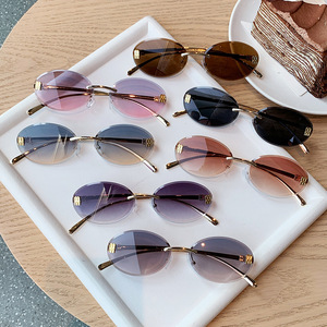Oval <b>Frameless</b> Metal Sunglasses UV400 Type 3 Light Weight Unisex Gold <b>Frame</b> PC Lens - Product Image 1