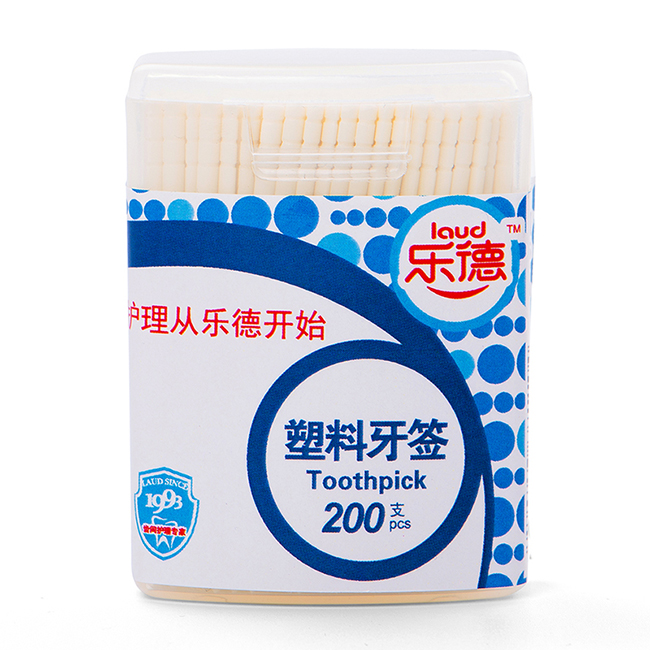 Пластиковая зубная щетка мятного цвета в коробке