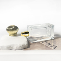 Bouteilles de parfum uniques bocaux en verre avec couvercles bouteille d'huile d'olive vide clair parfum atomiseur bouteille de parfum en verre 100ml
