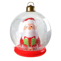 Boule de Noël transparente gonflable avec Père Noël et flocons de neige intégrés pour une ambiance festive en extérieur