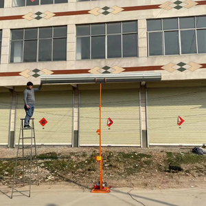 Plateforme élévatrice électrique portable télécommandée pour le levage de marchandises, petites grues pour l'installation de portes à enroulement - Product Image 4