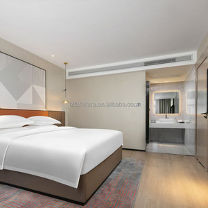 Meubles de chambre d'hôtel fournis directement par l'usine, lit king size avec cadre en bois, matelas et ensemble de literie en coton. - Product Image 5