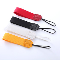 Cordon de sécurité universel portable pour poignet avec joint en cuir et sangle robuste pour appareil photo reflex numérique, smartphone, GoPro, clés