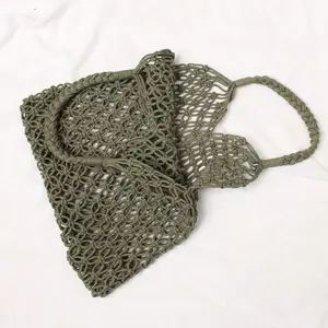 Borsa da spiaggia in stile Ins borsa da donna estiva in rete cava borsa in paglia per le vacanze con corda di cotone a mano borse a maglia larga