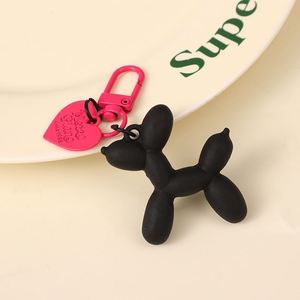 Ins Love Porte-clés en acrylique, motif chien ballon, style mignon et cool, pendentif pour sac et bijoux, figurine - Product Image 1