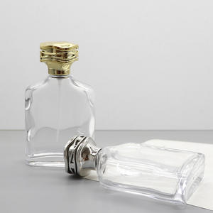 Vente en gros de flacons de parfum en verre transparent carrés de 100 ml, flacons cosmétiques vides blancs cristallins avec bouchons à clipser - Product Image 1