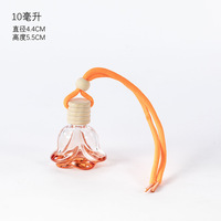 Diffuseur de parfum pour voiture en forme de fleur, 10 ml, bouteille en verre avec bouchon en bois et cordon de suspension, pour huiles essentielles.