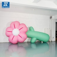 Modèle de fleur gonflable géante rose personnalisée pour la publicité et la décoration d'activités dans les espaces scéniques extérieurs