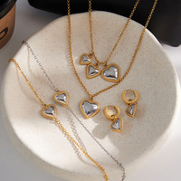 CAIOOCHE Ensemble de bijoux fins bicolores en forme de cœur, chaîne en acier inoxydable, bracelets, colliers, boucles d'oreilles, bijoux tendance pour femmes